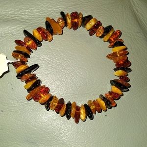 BALTIC AMBER STRETCH BRACELETS. PLEASE ALLOW FOR VARIATIONS. OVAL OR CHIPS.